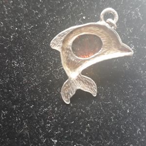 Sterling silver and amber dolphin pendant